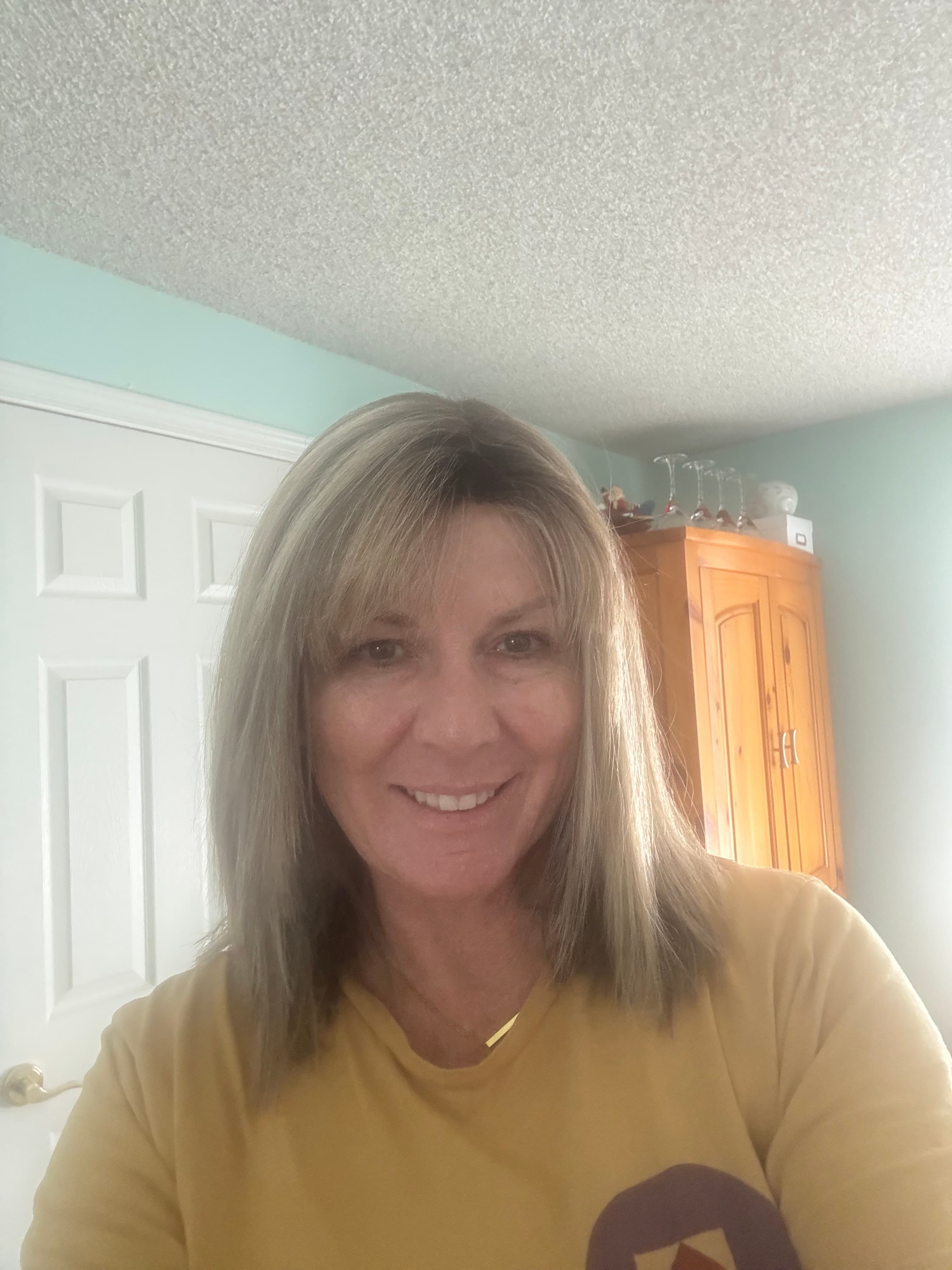 Raquel Welch synthetic blond highlights bangs