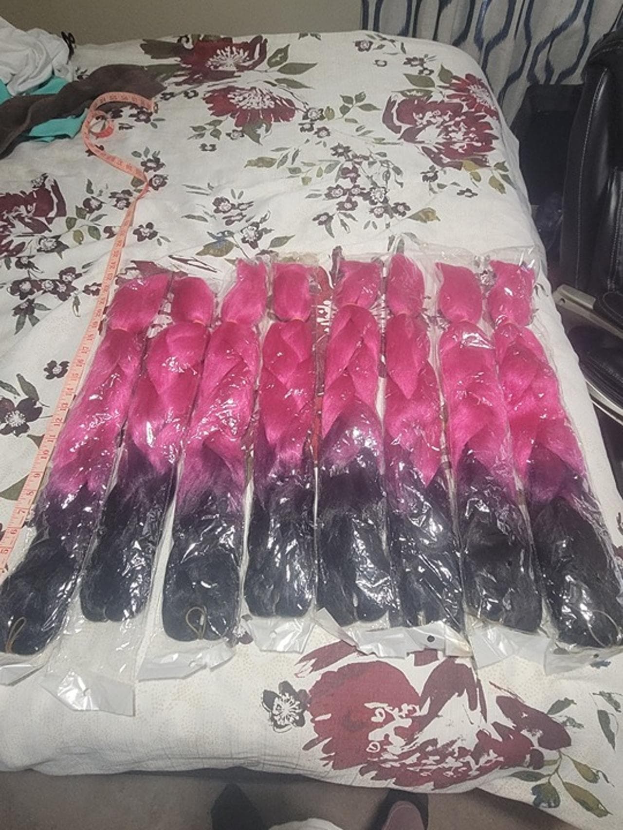 Eight Pink, Purple, and Black Synthetic Hair Braids